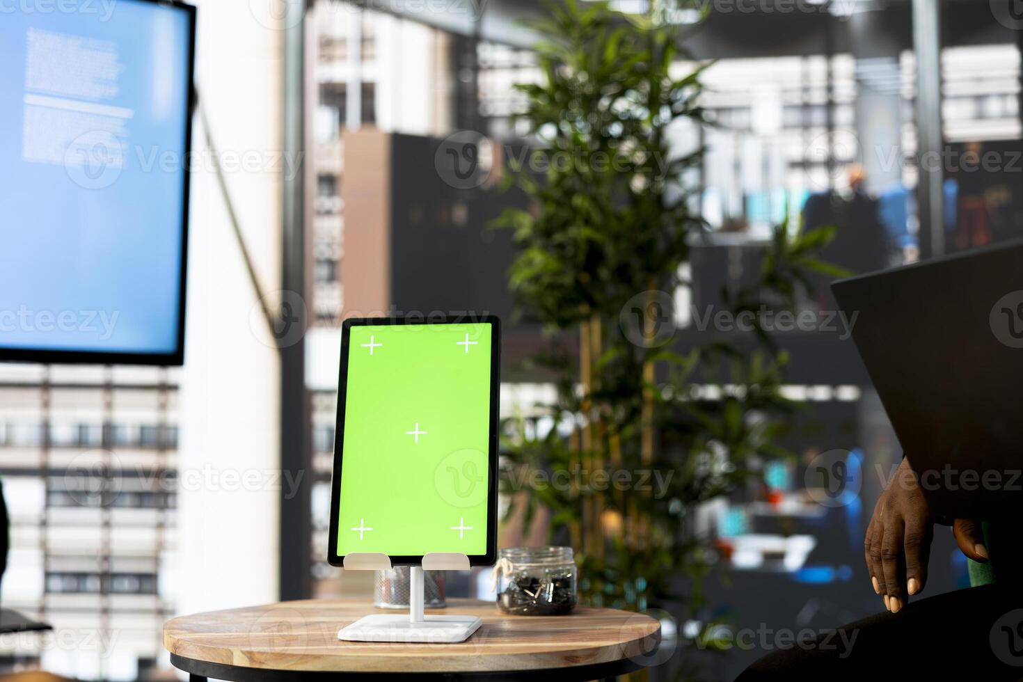Green screen tablet next to manager overseeing and coordinating daily administrative operations within organization. Supervisor reviewing company administrative systems on mockup device photo