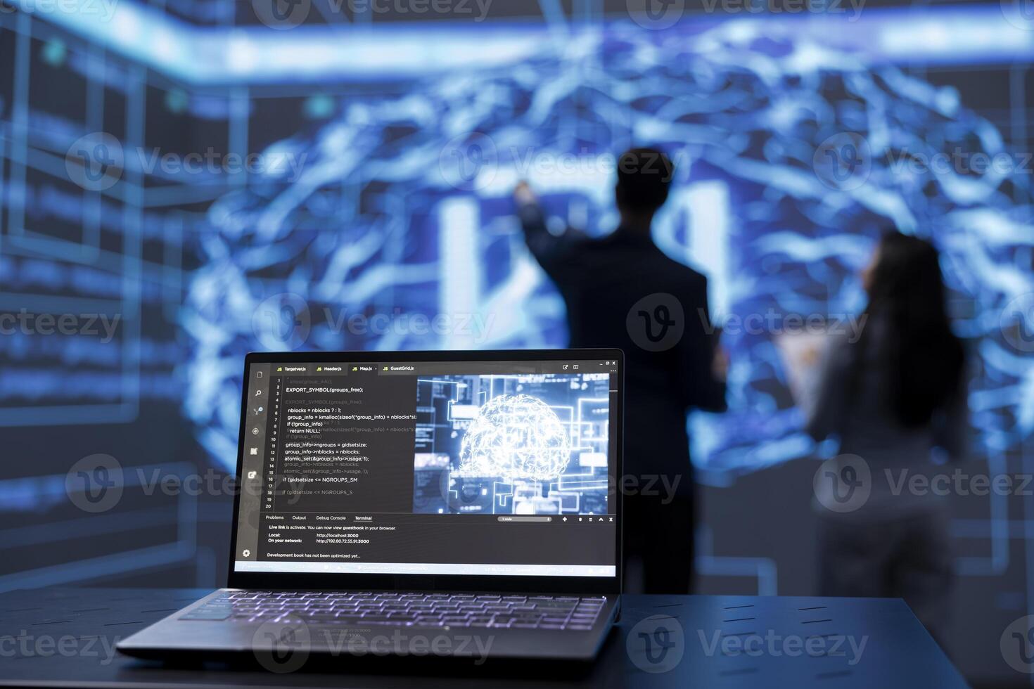 Focus on laptop used by engineers in blurry background to use AI cognitive computing. Close up shot of notebook used by IT professionals to run artificial intelligence technology on notebook photo