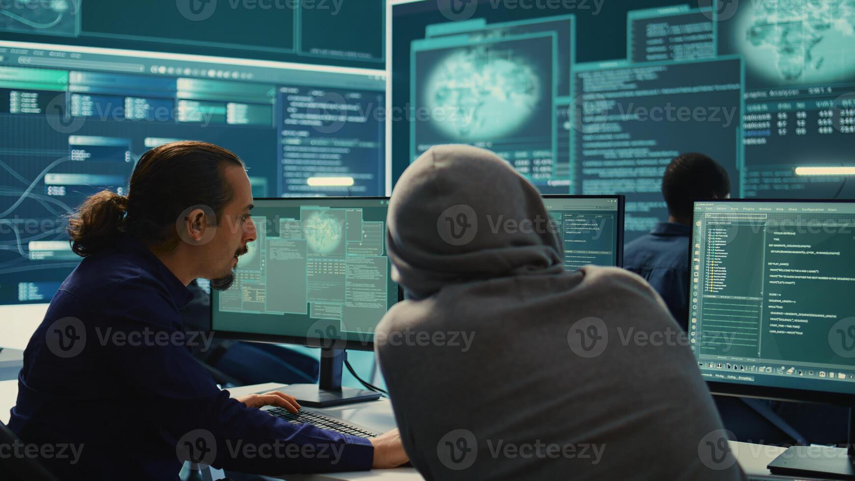 Cyber security experts in a governmental hacking room working on securing networks. Hackers focusing on malware detection, cyber operations and protection against digital mercenaries. Camera B. photo