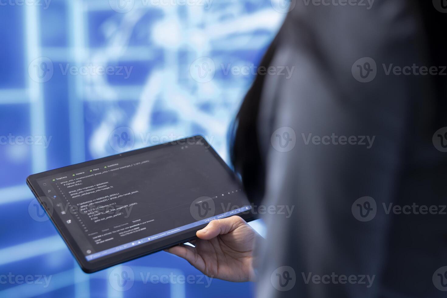 Engineer uses tablet and AI deep neural networks modeled after human brain to solve complex problems. Close up of admin using machine learning model to look at data and better complete tasks photo