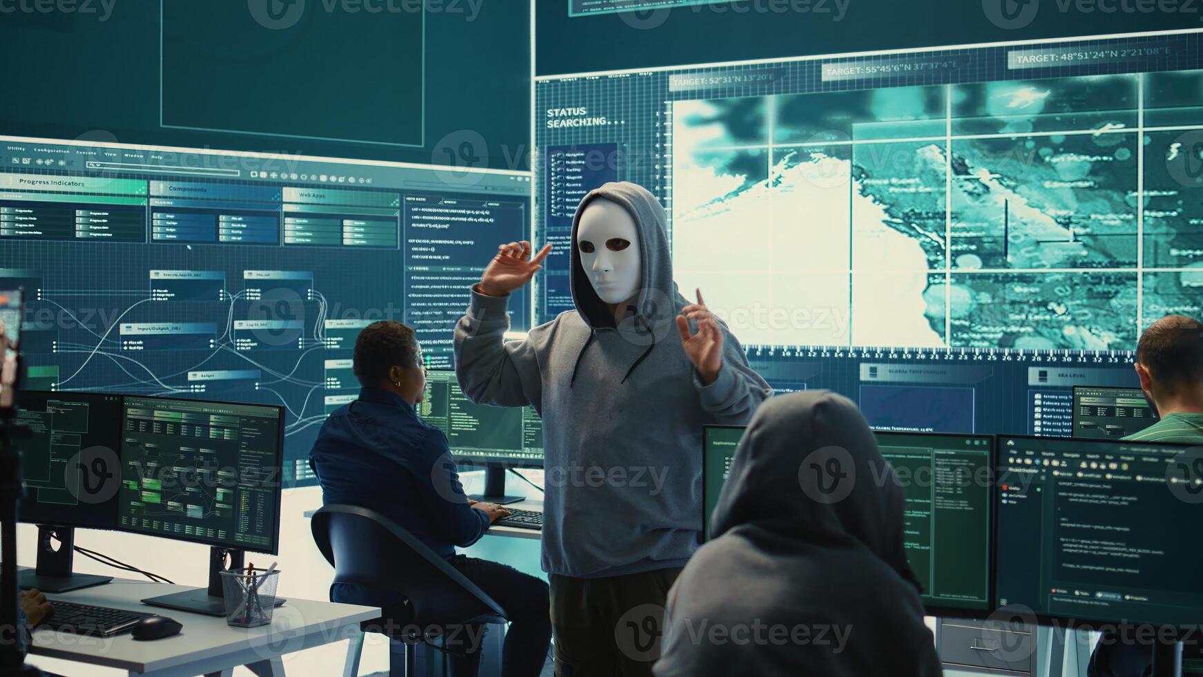 Governmental anonymous hackers group asking ransom for state secrets, important hacking activity during hybrid war. Recording a after stealing top secret information, big screen. Camera B. photo