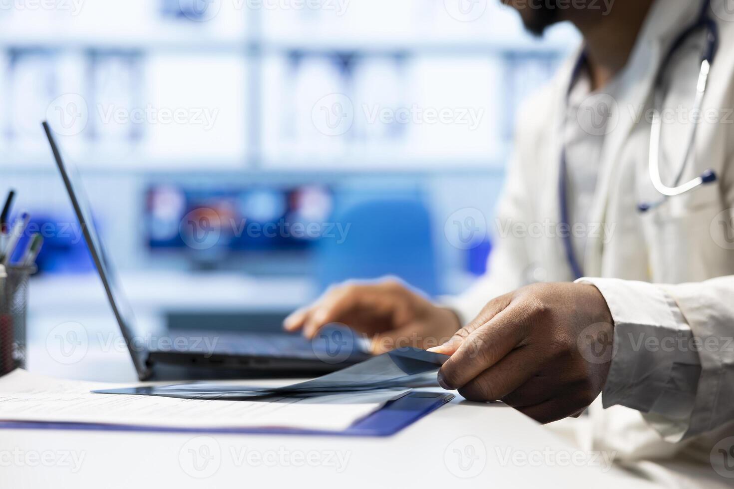 Doctor comparing hospital records and test results in an office to examine disease diagnosis and find suitable treatment. General practitioner with expertise at medical facility. Close up. photo