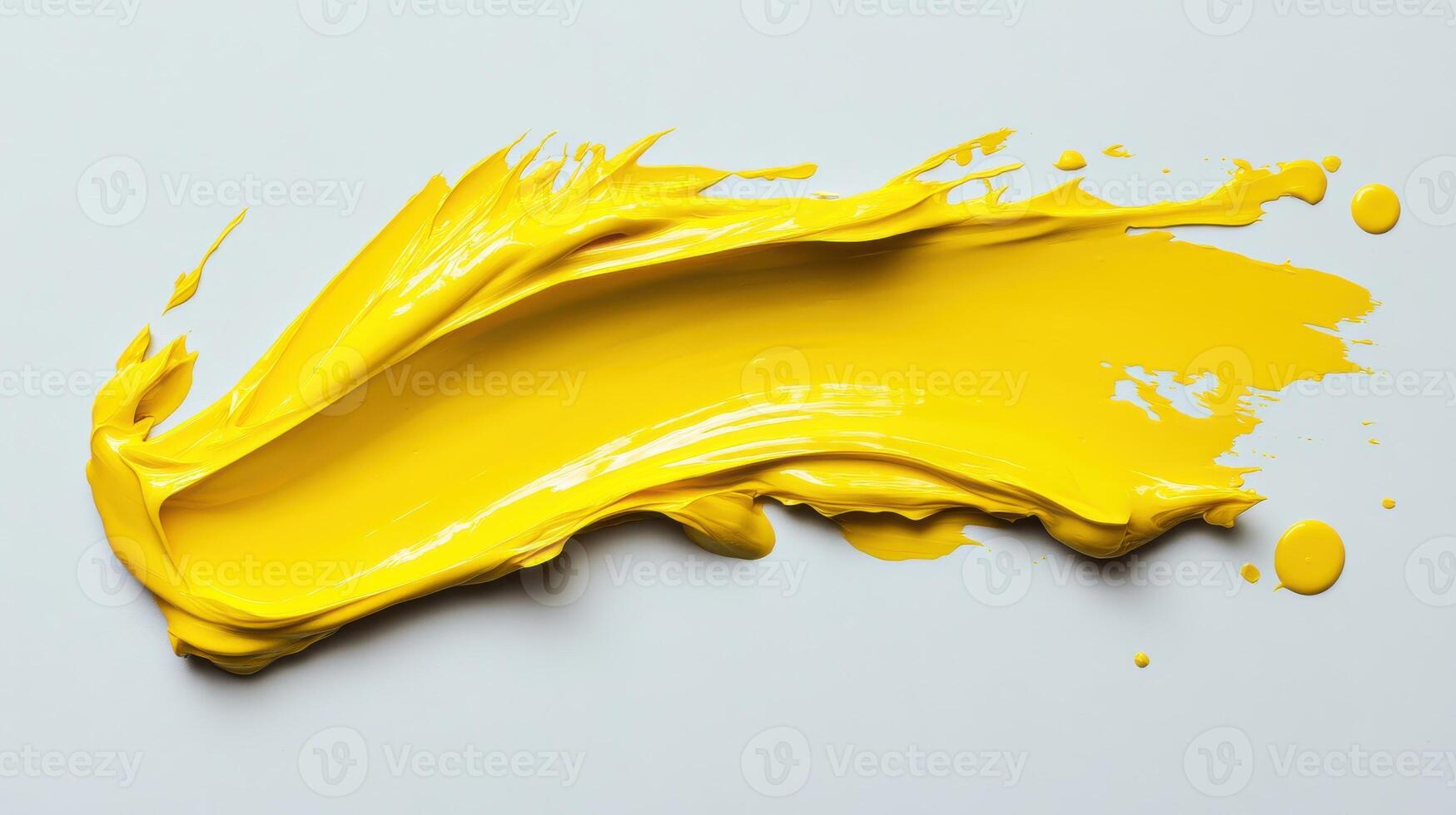 Vibrant yellow paint stroke on white background capturing artistic creativity photo