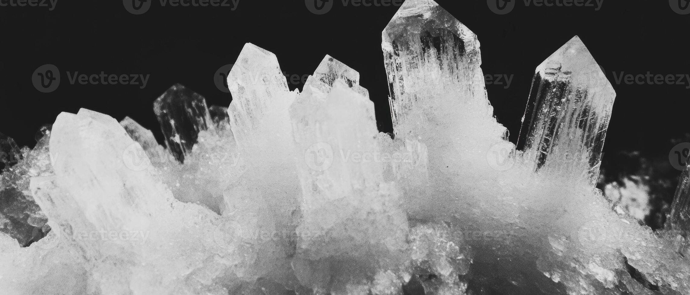 Delicate frozen patterns of ice crystals showcasing intricate geometric shapes photo