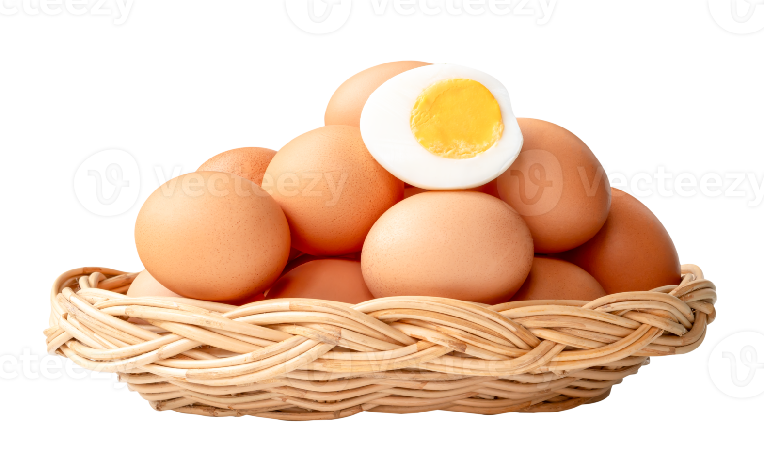 Large group of raw brown chicken eggs and peeled cooked or boiled eggs with egg yolk in half in stack in wicker basket isolated with clipping path in file format png