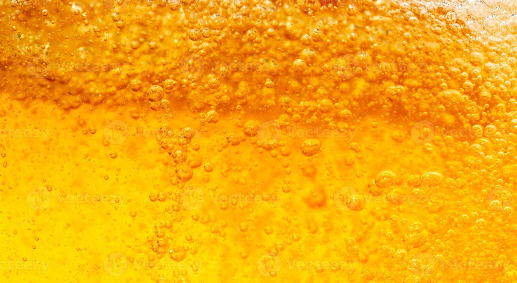 Close up bright orange Oil or beer splash texture and nature waves, Beautiful waves curve and little bubbles smooth for graphic design and background Oil Bubbles Soft beer bubbles photo
