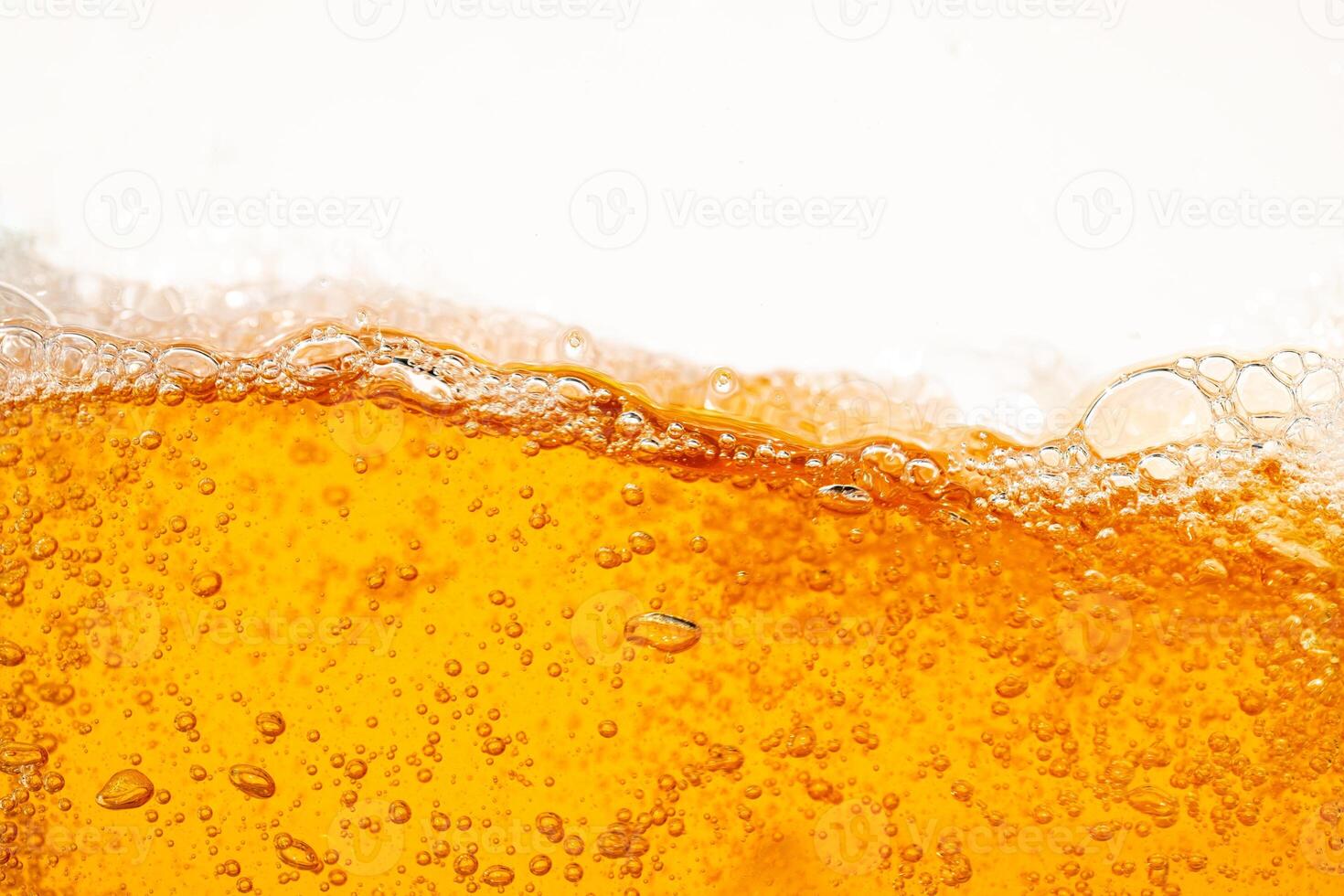 Close up bright orange Oil or beer splash texture and nature waves, Beautiful waves curve and little bubbles smooth for graphic design and background Oil Bubbles photo