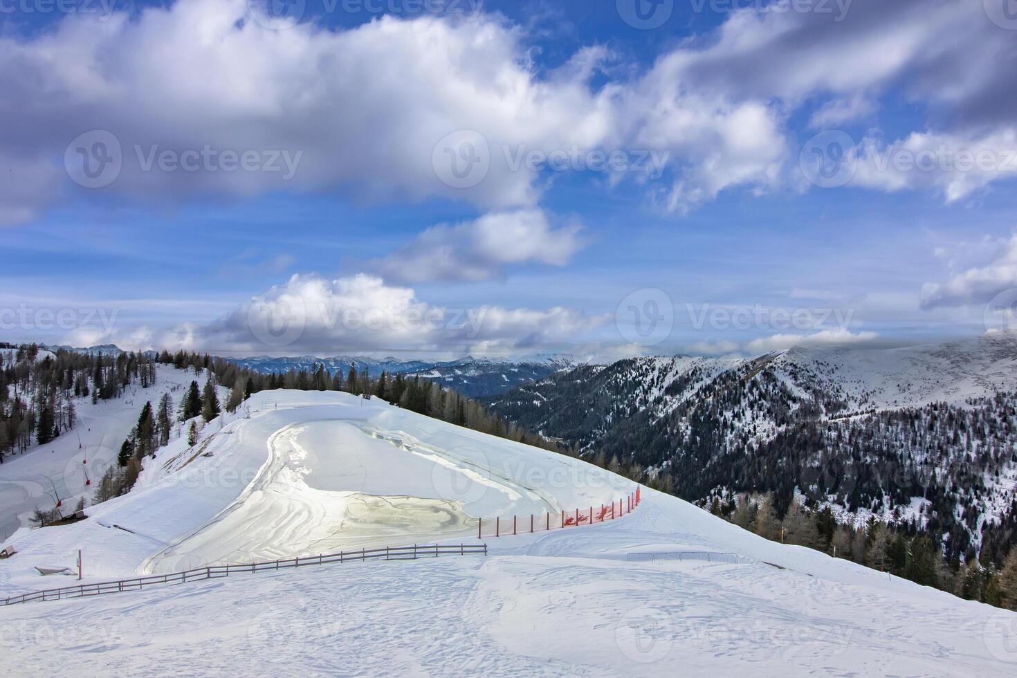 Snowy alpine landscape with glacier lake - Bad Kleinkircheim in Austria photo