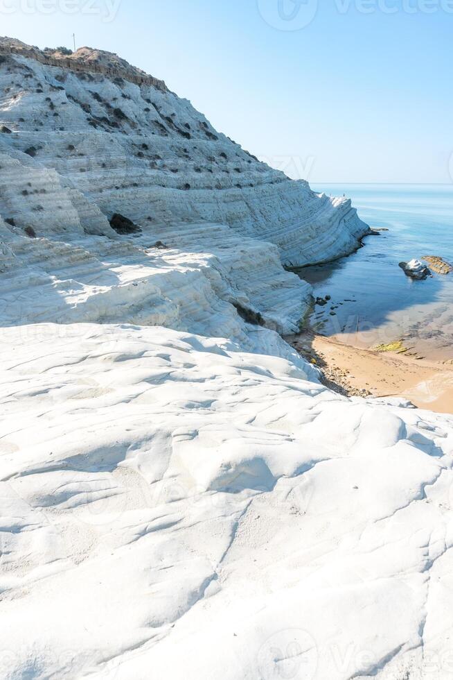 the piece of coast in Sicily called the Scala dei Turchi during a sunny day. photo
