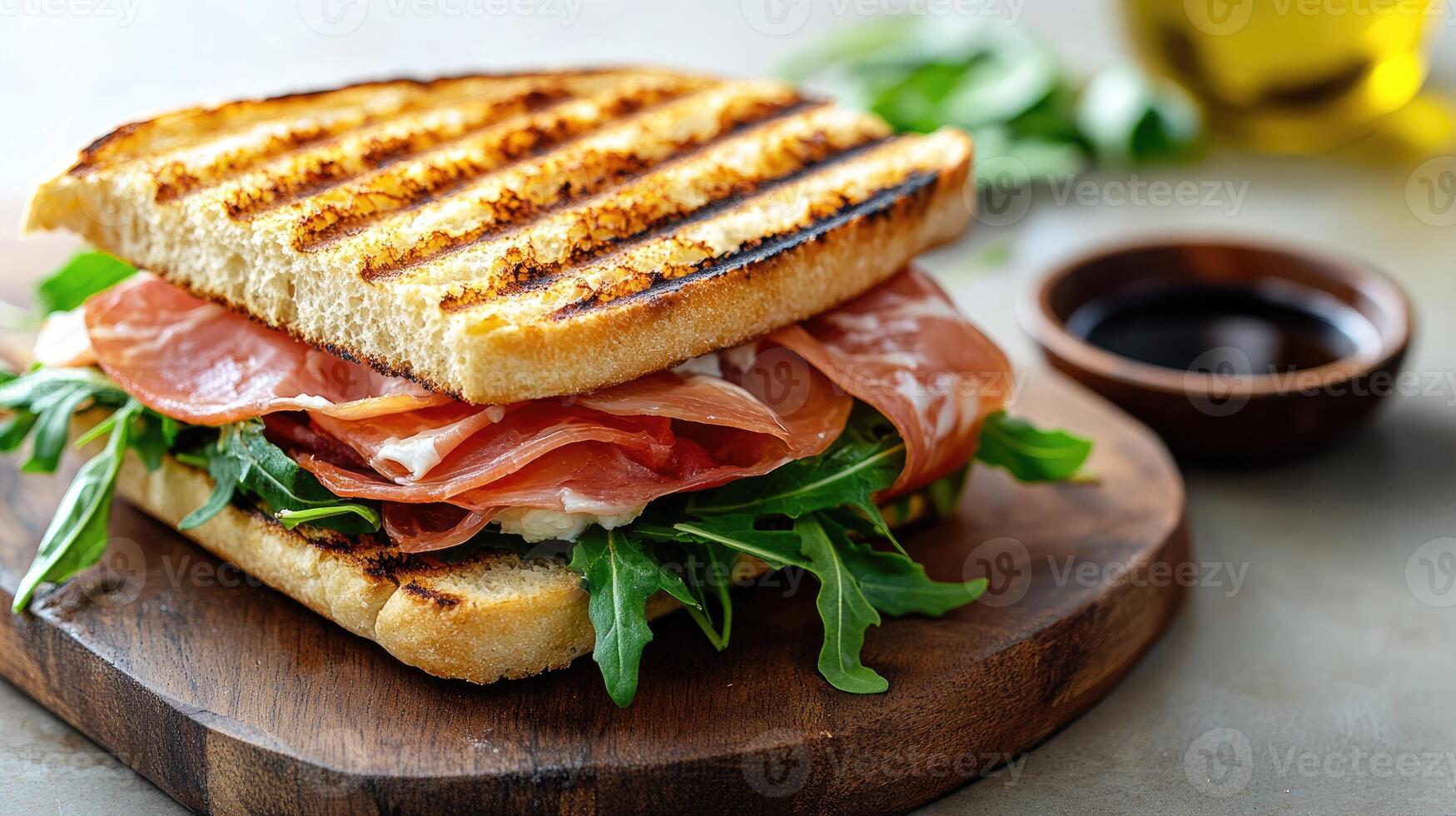 Delicious grilled panini with prosciutto, arugula, photo