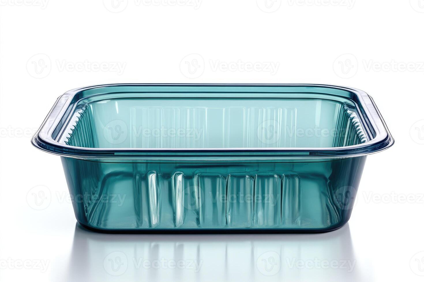 Empty green plastic food container on white background photo