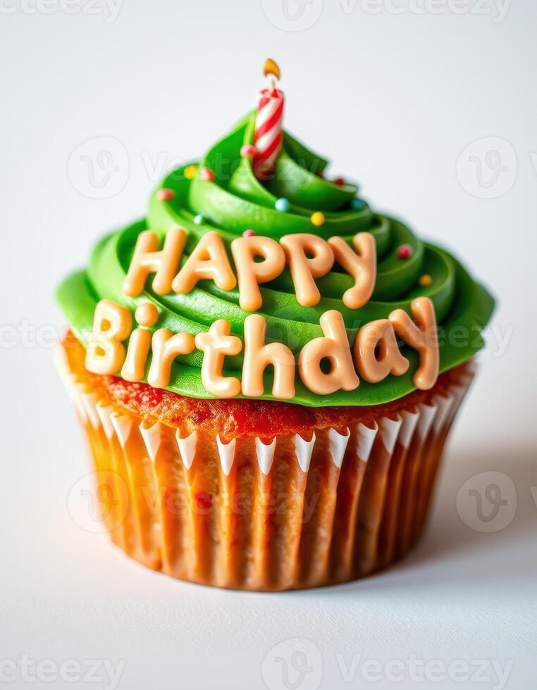 Colorful birthday cupcake with green frosting and a candle celebrating a special occasion photo