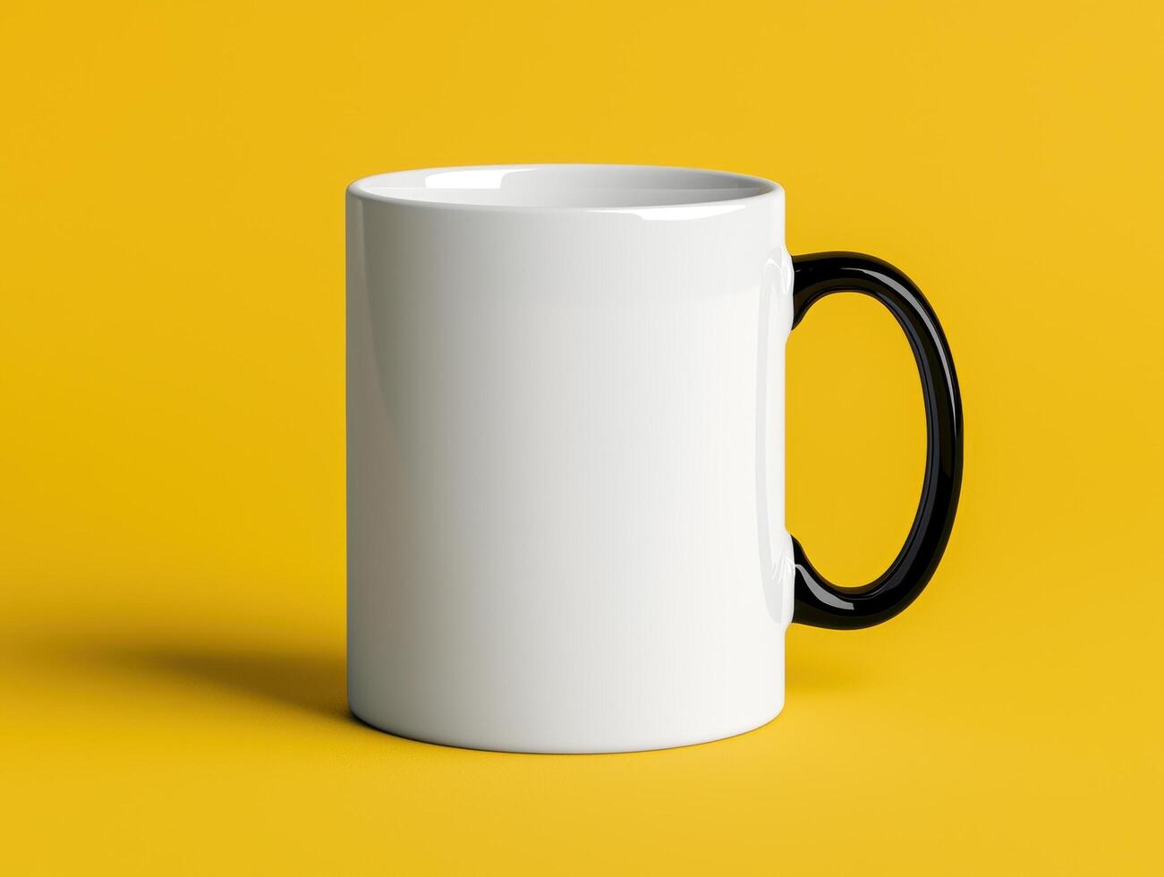 White mug with black handle on yellow background. photo