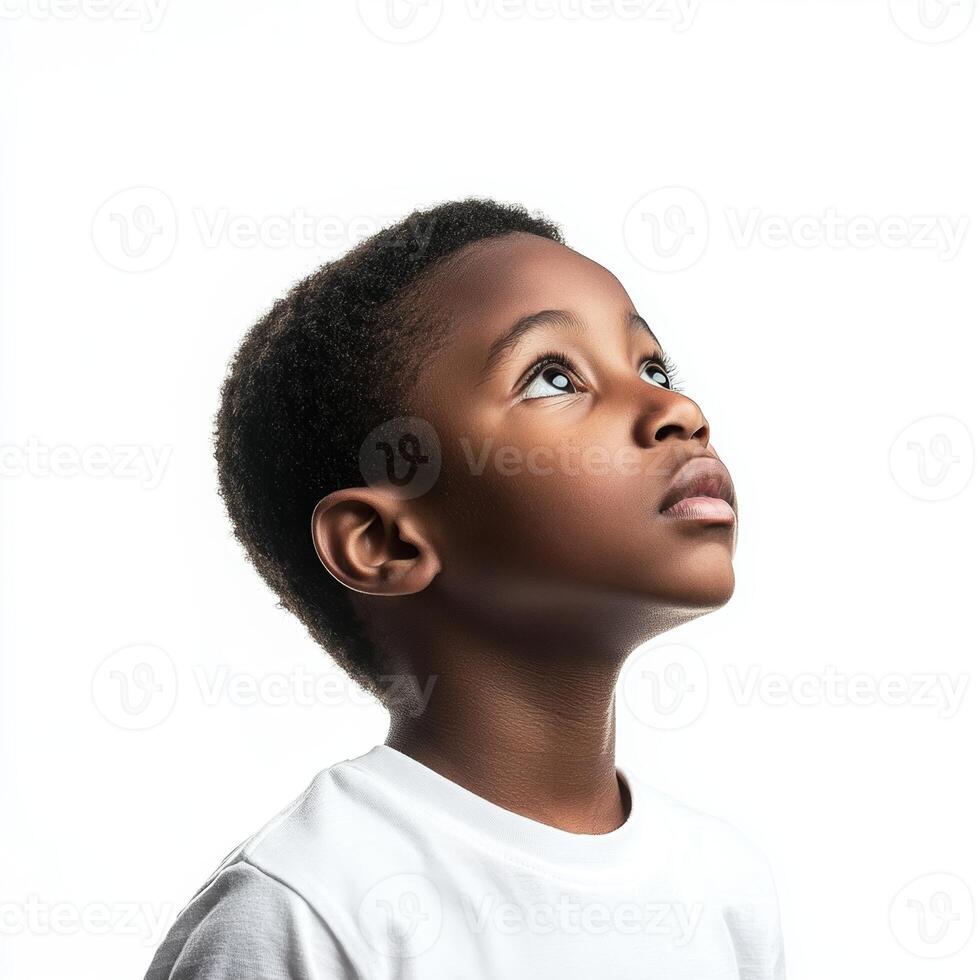 A young boy looking up at something photo