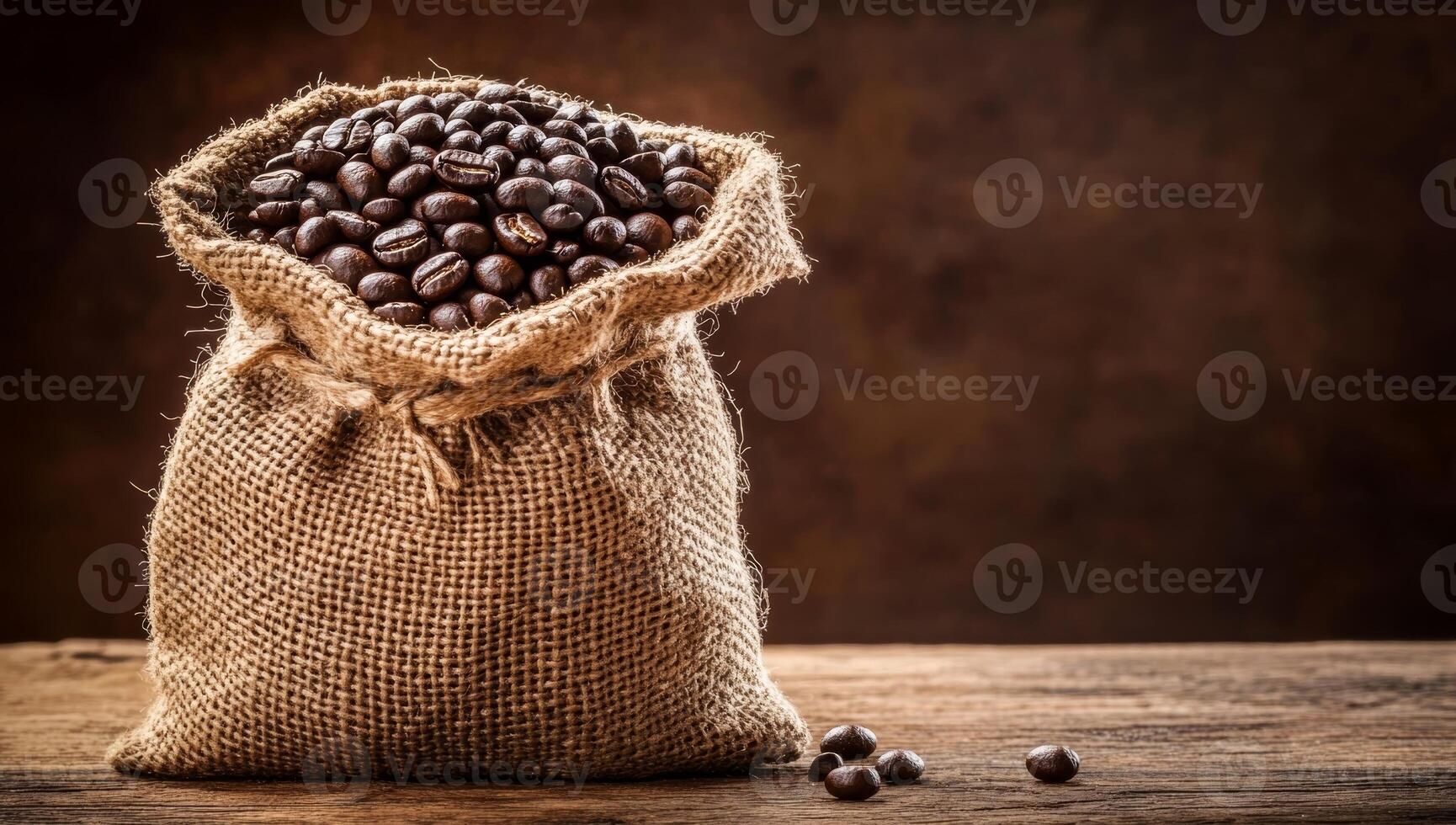 Coffee Beans in a Burlap Sack on Wooden Table photo