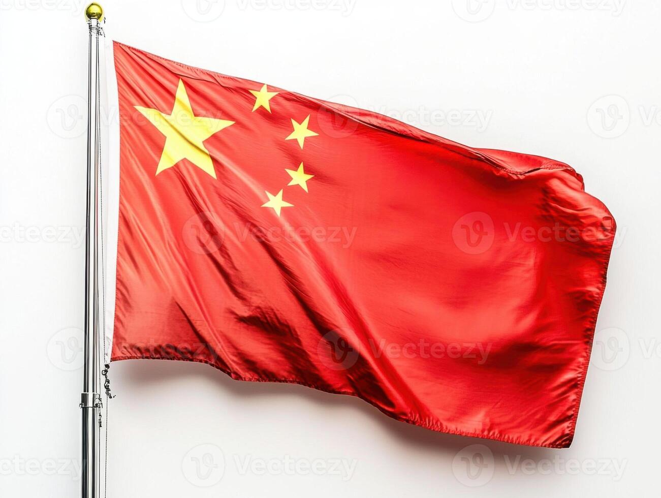Chinese national flag waving against a plain background during a clear day photo