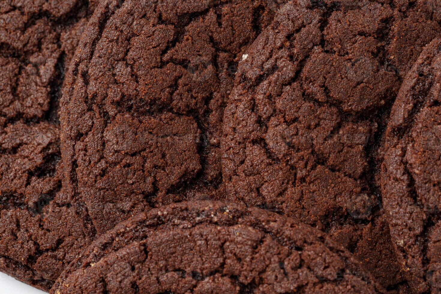 Chocolate cookies baked to perfection with a rich, textured surface showcasing their soft interior photo