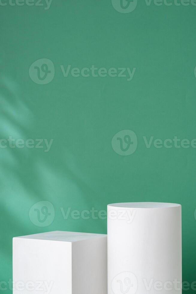 Simple geometric shapes on a green background with soft lighting photo