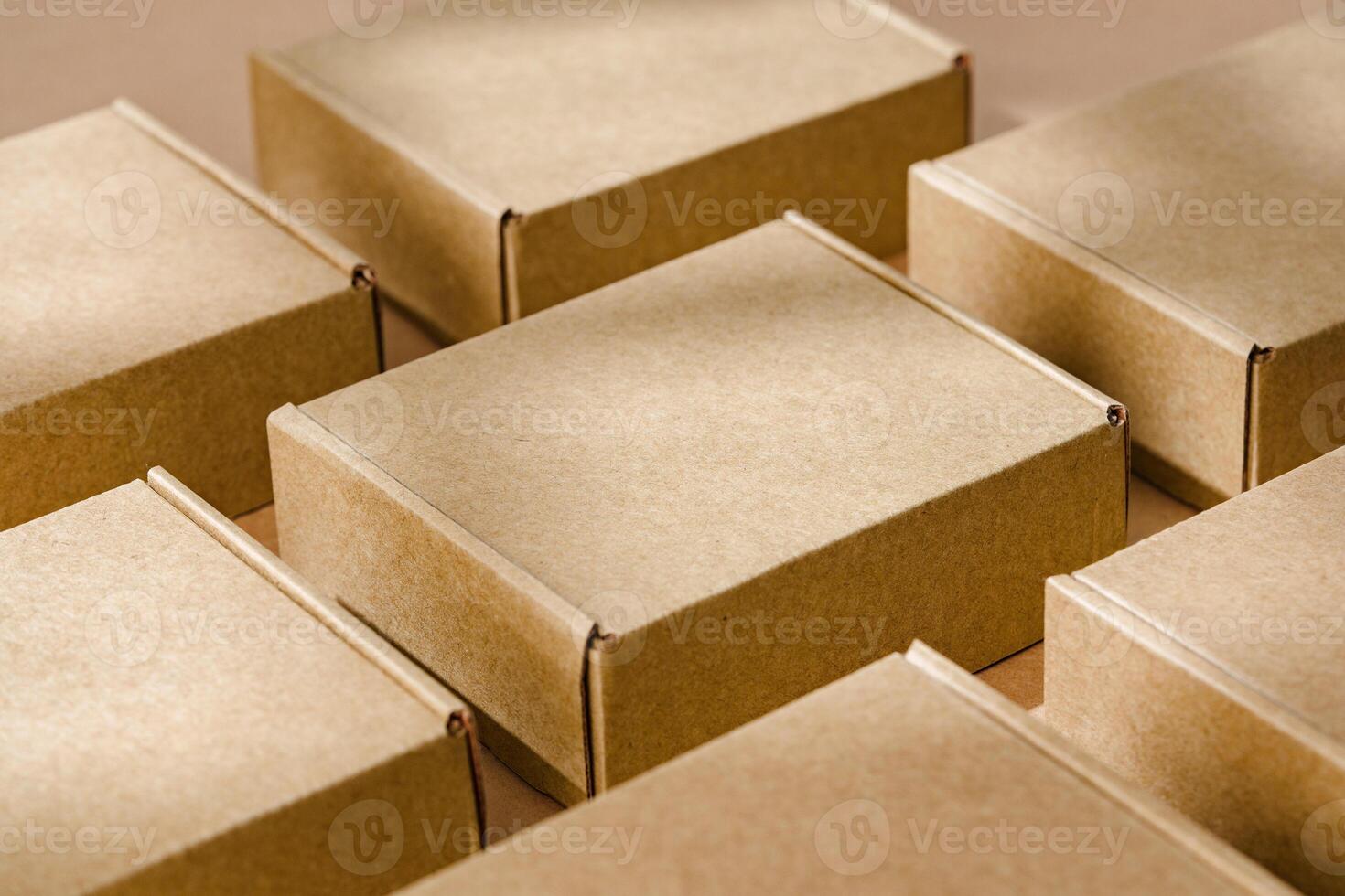 Brown cardboard boxes arranged neatly on a workspace, showcasing packaging materials for shipping and storage activities photo