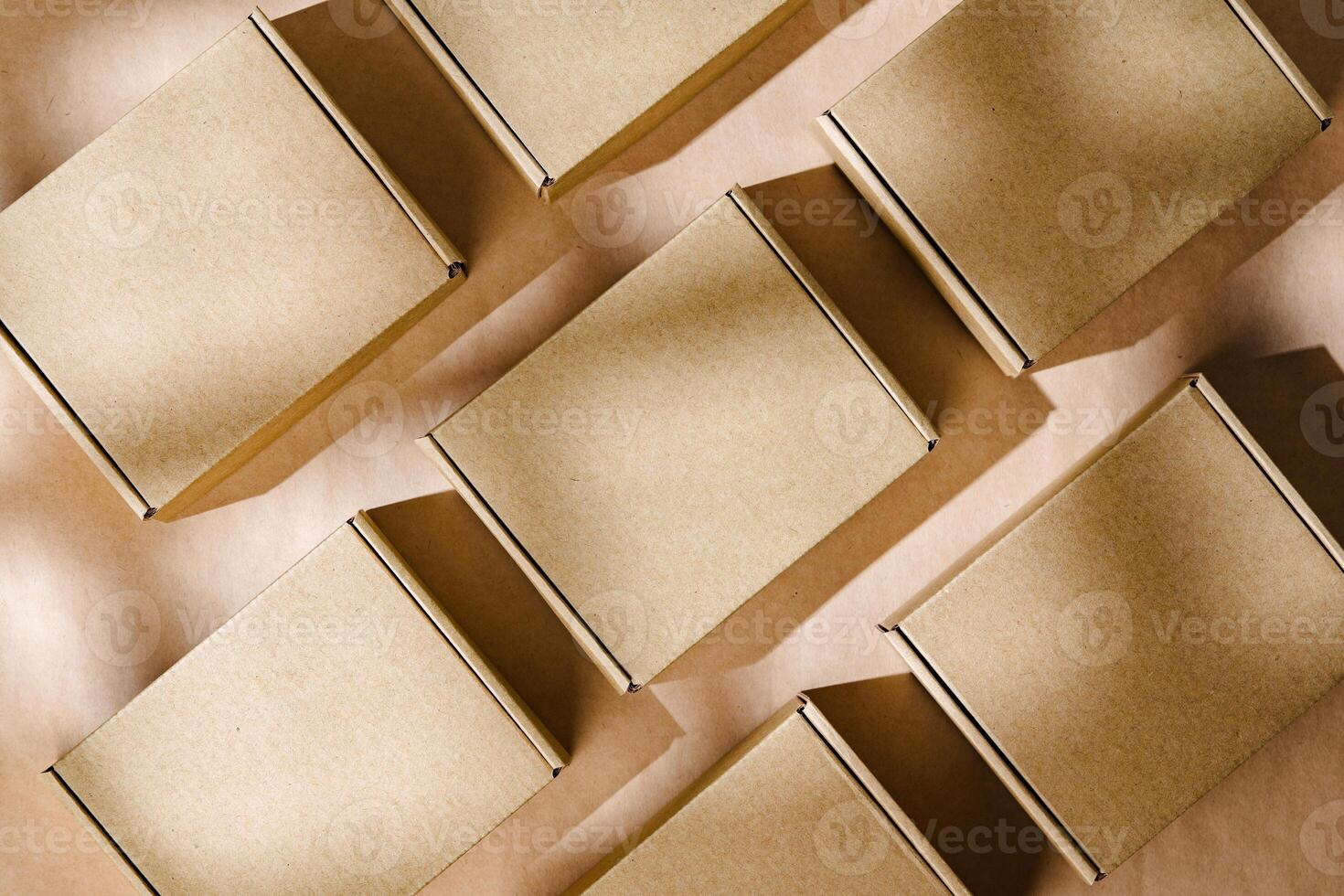 Brown cardboard boxes arranged neatly on a workspace, showcasing packaging materials for shipping and storage activities photo