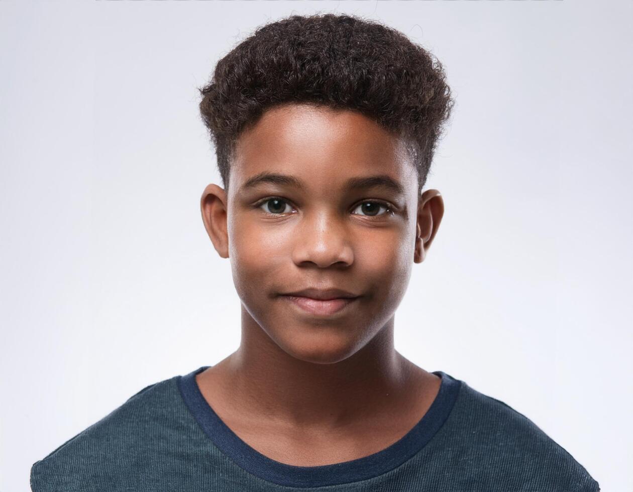 Portrait of African Teenager with Defined Dreads and Expression on White Background photo