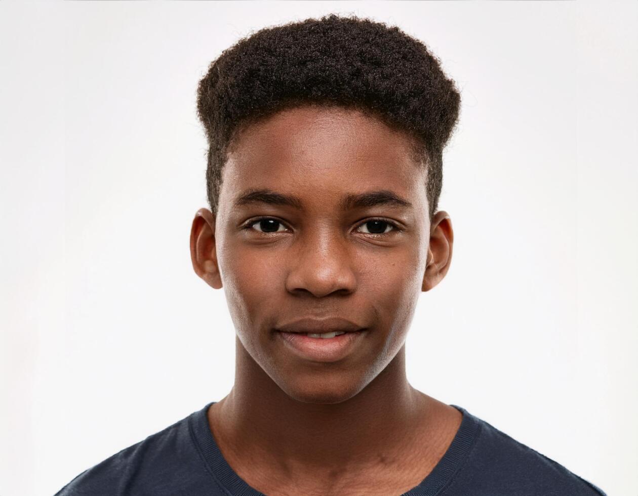 Studio Portrait of African Teenager with Defined Kinks and Expression on White Background photo