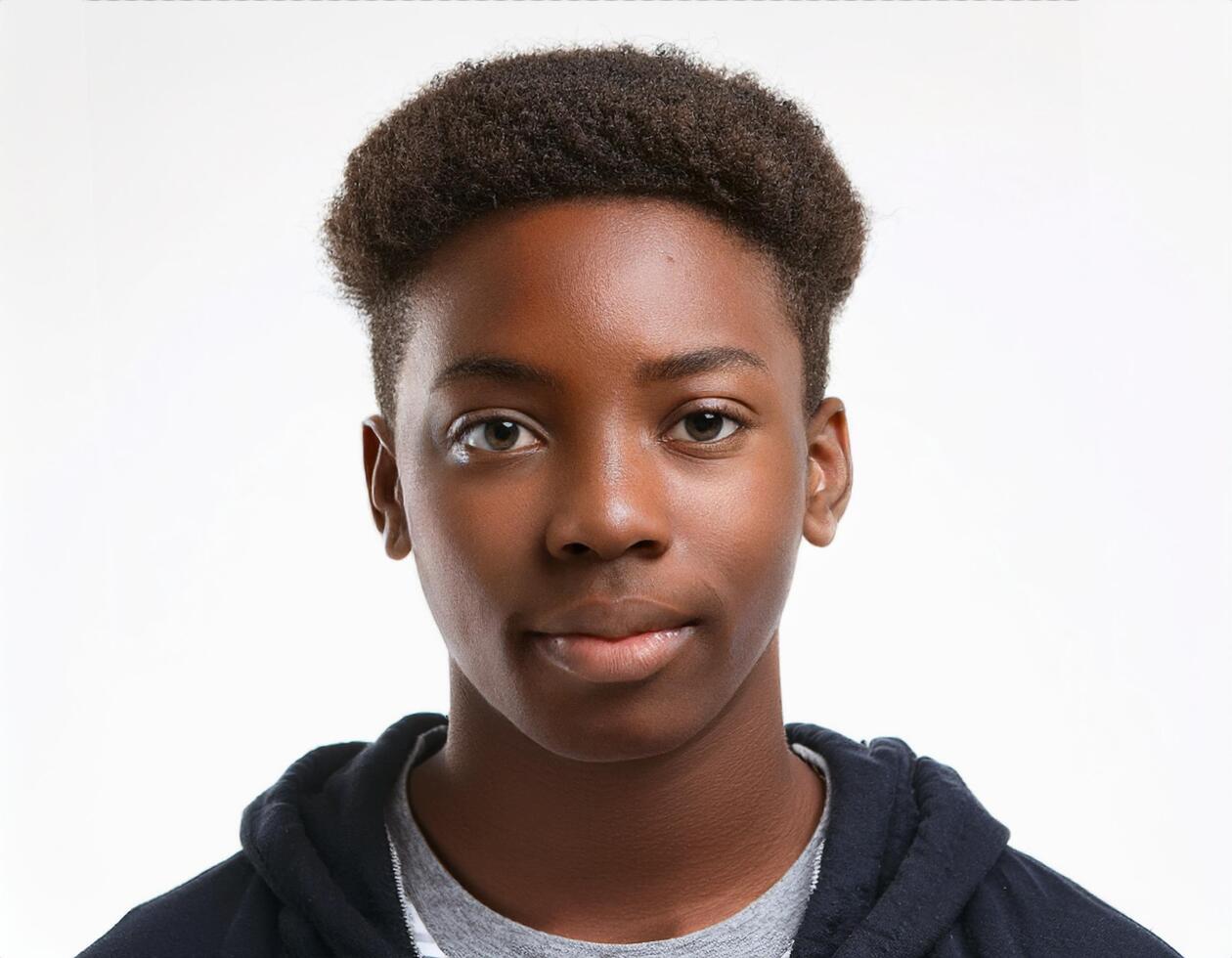 Studio Portrait of African Teenager with Tightly Braided Curls on White Background photo