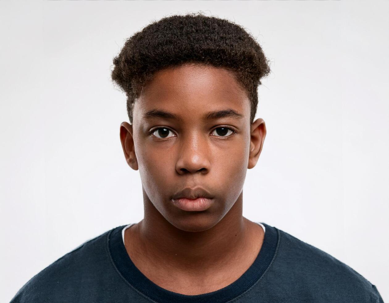 Portrait of African Teenager with Defined High Curl Braids on White Background photo