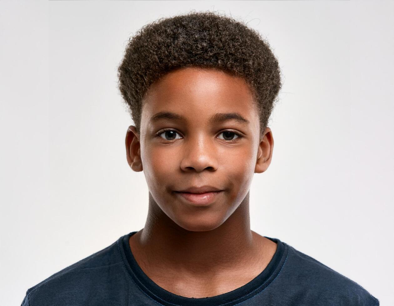 Studio Portrait of African Teenager with Defined Tight Curls on White Background photo
