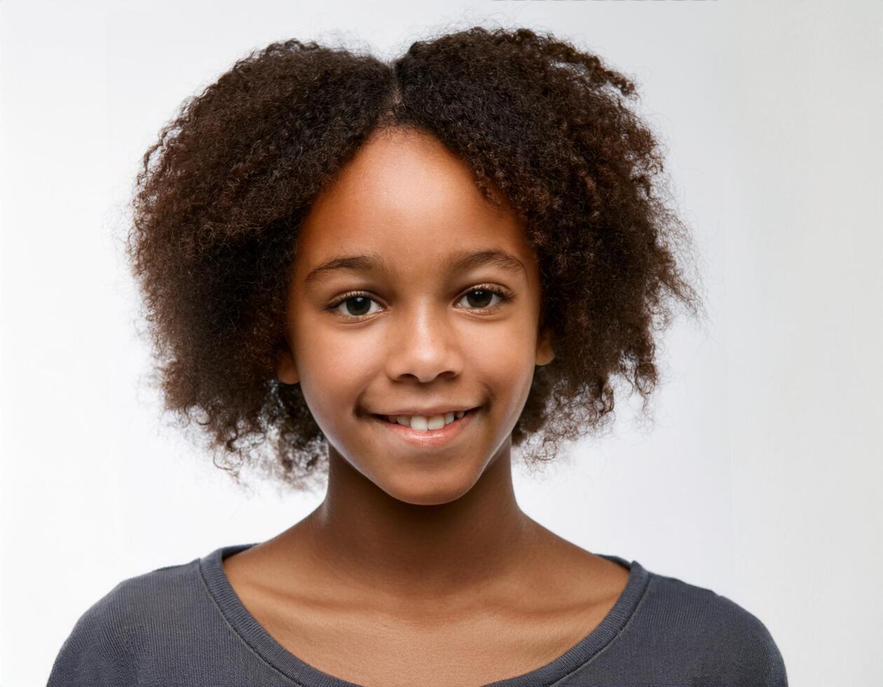 Close Up Portrait of African Teenager with Defined Tight Ringlets on White Background photo