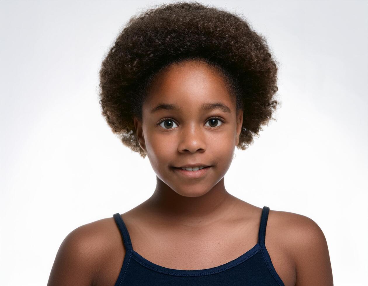 Studio Portrait of African Teenager with Defined Defined Long Braided Curls on White Background photo
