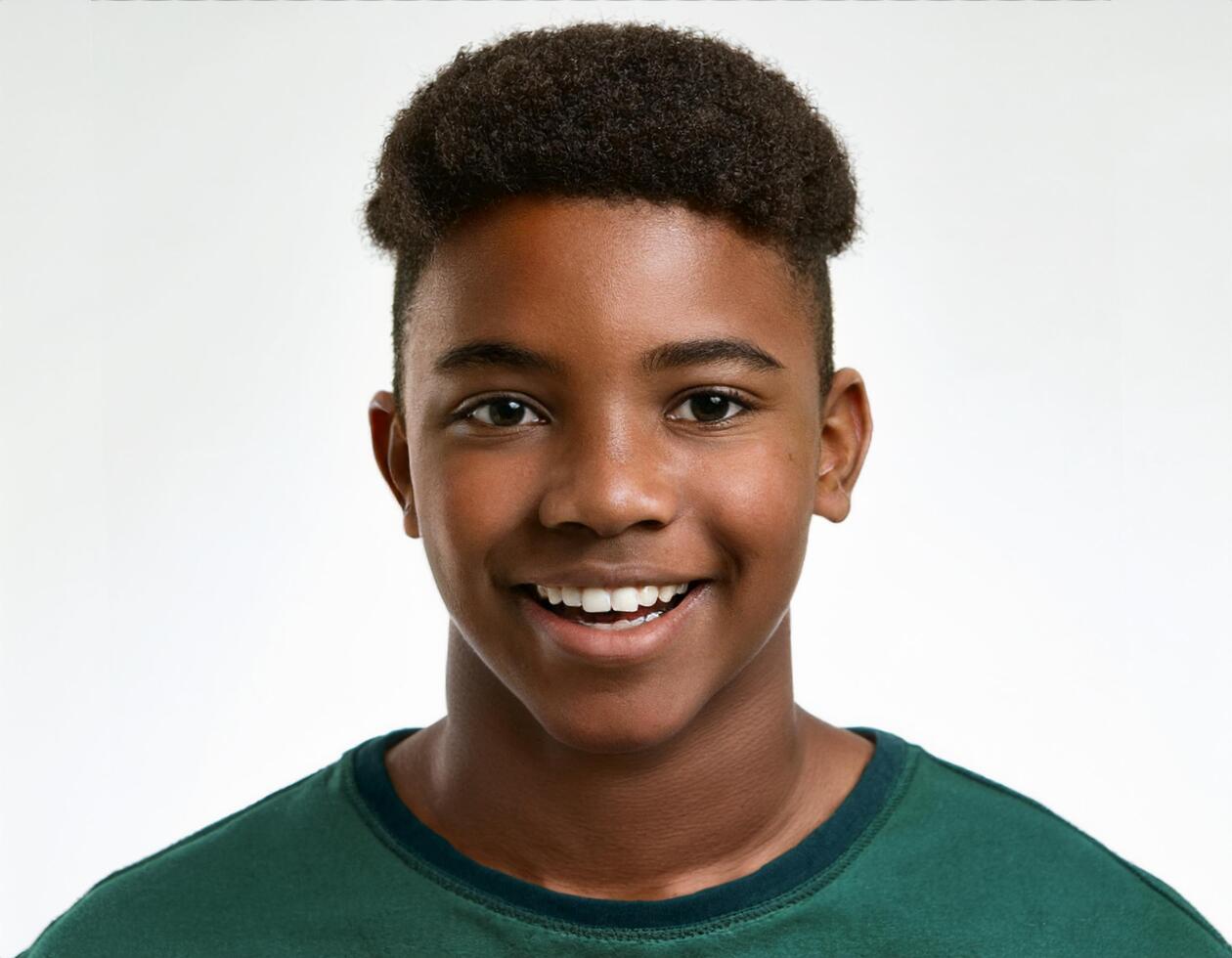 Studio Portrait of African Teenager with Defined Defined Tight Curls on White Background photo
