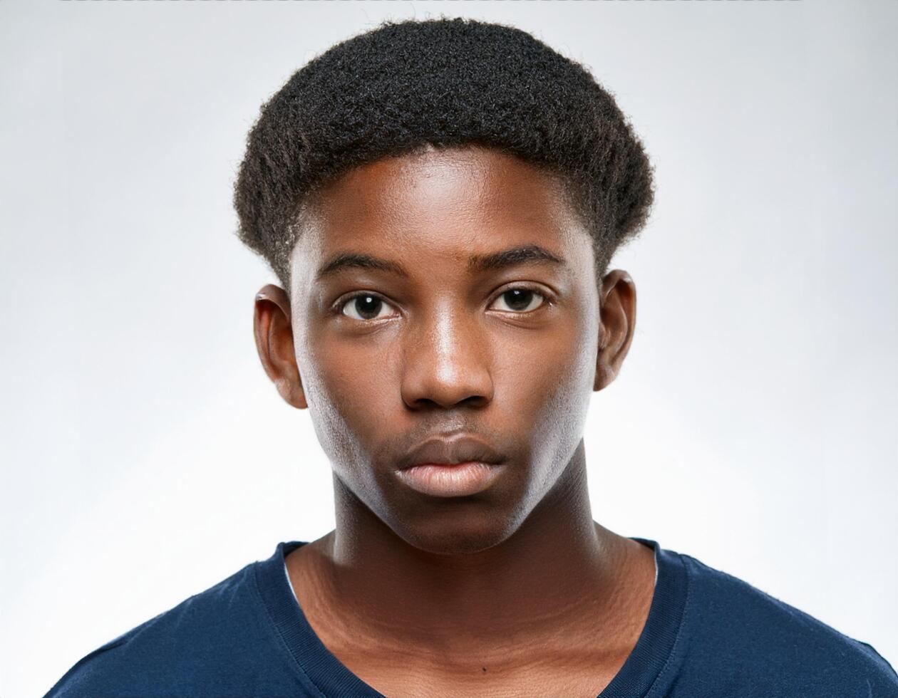 Portrait of African Teenager with Defined Defined Long Braided Curls on White Background photo