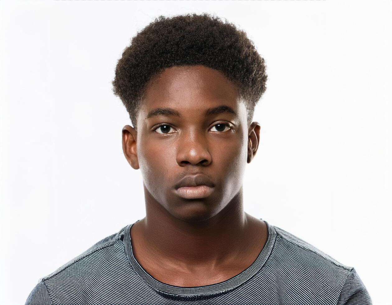 Close Up Portrait of African Teenager with Defined Defined Soft Natural Curls on White Background photo