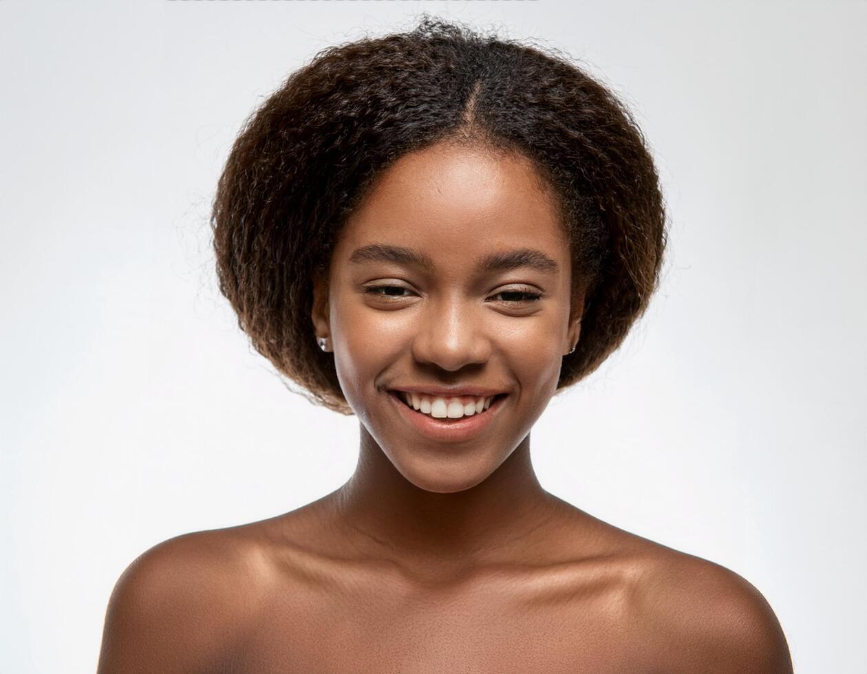 Close Up Portrait of African Teenager with Defined Defined Defined Defined Curly Hairstyle on White Background photo