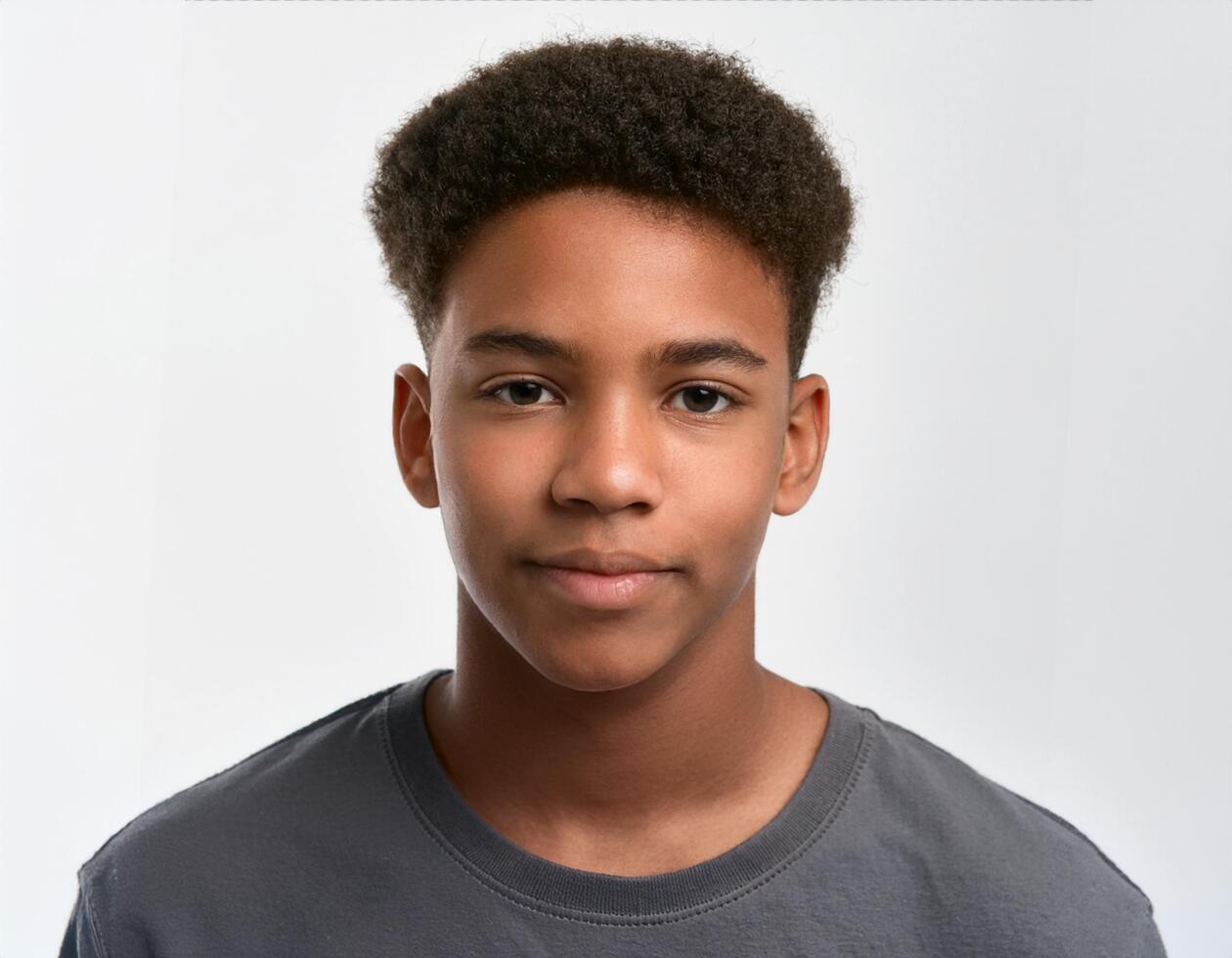 Portrait of African Teenager with Defined Defined Defined Short Natural Curls with Expression on White Background photo