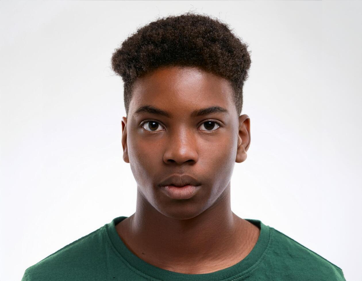 Studio Portrait of African Teenager with Defined Defined Defined Short Natural Curly Bob on White Background photo