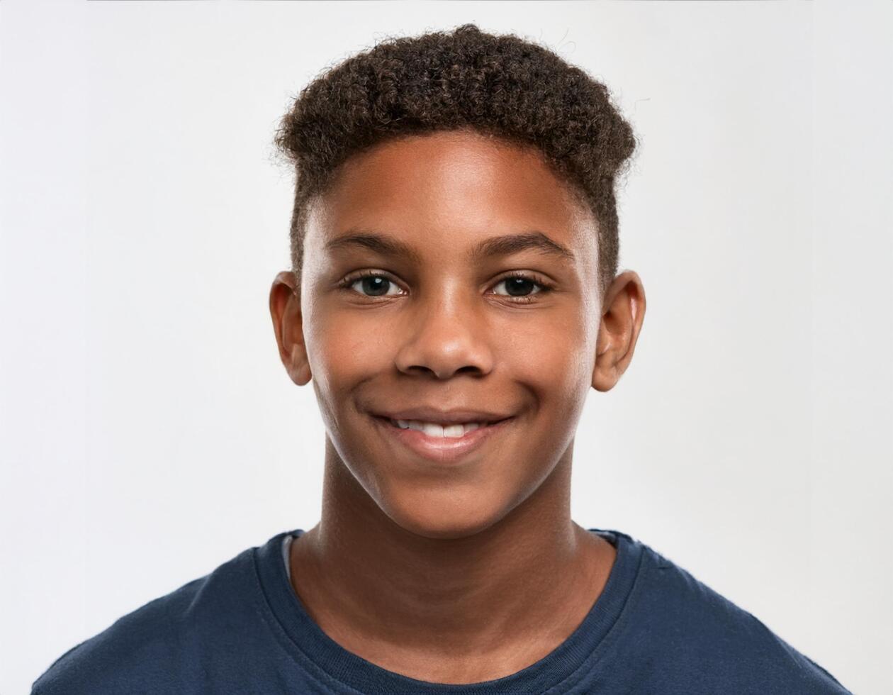 Studio Portrait of African Teenager with Defined Defined Defined Defined Natural Hair on White Background photo