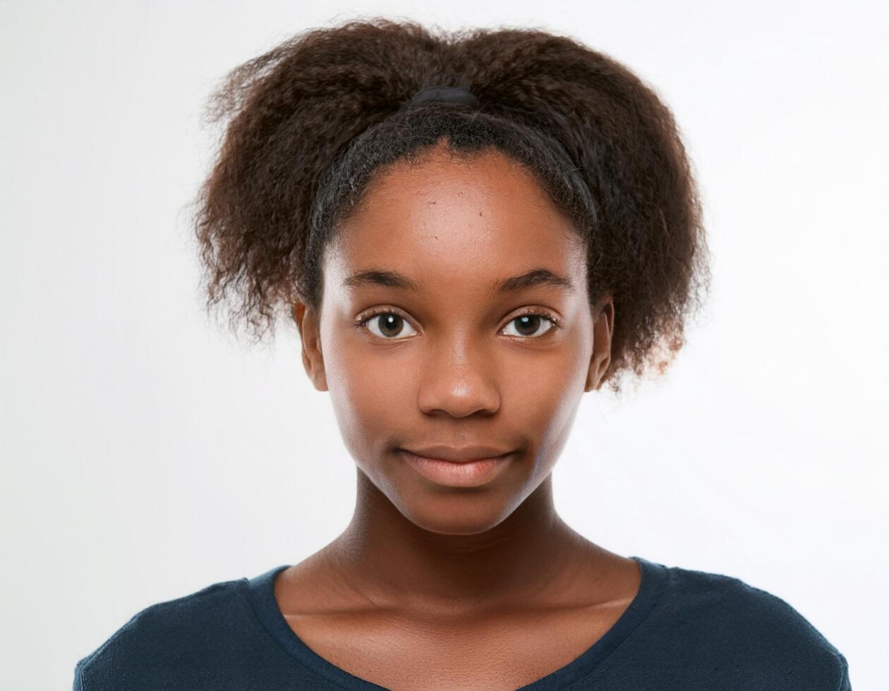 Close Up Portrait of African Teenager with Defined Defined Defined Soft Natural Braids on White Background photo