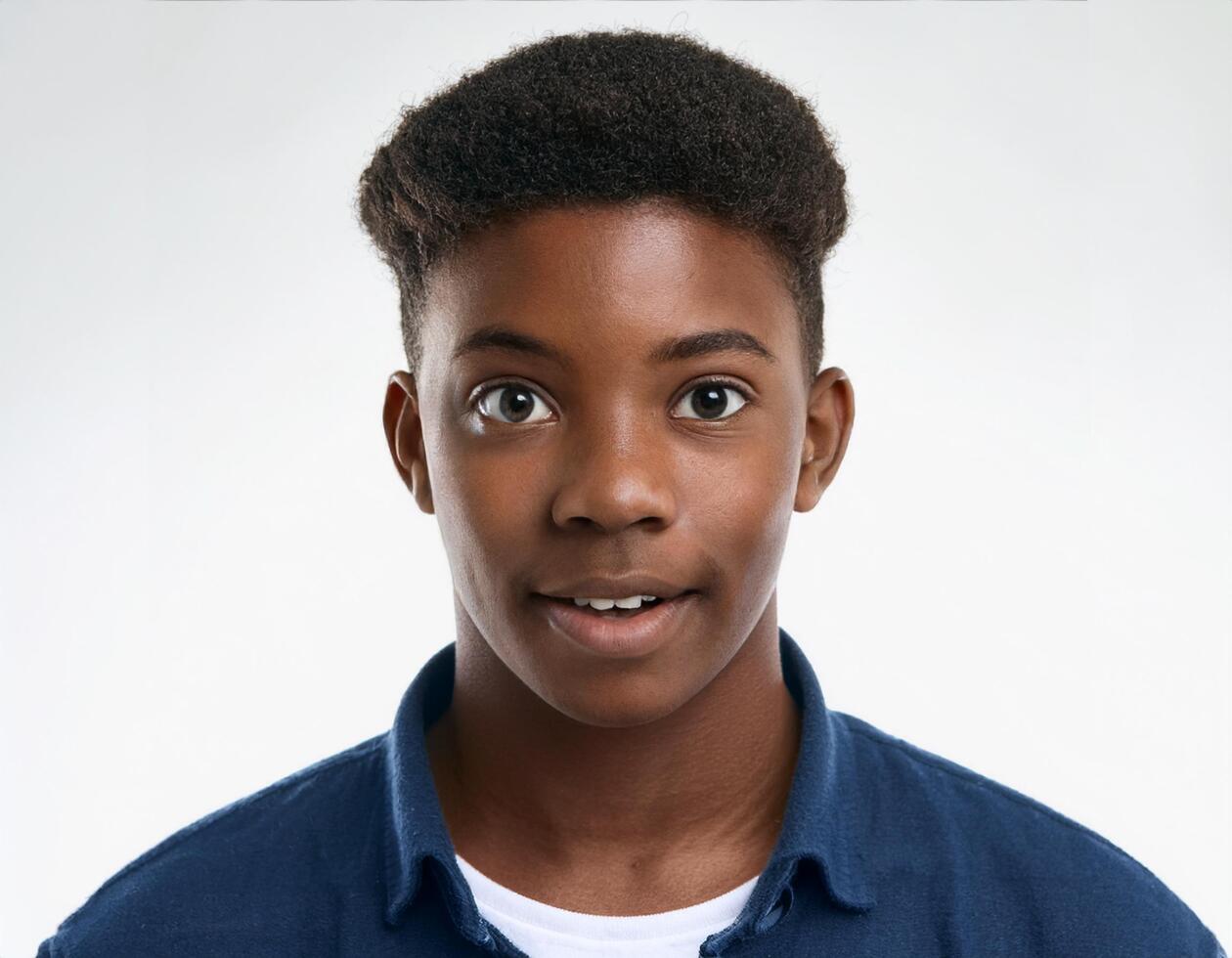 Close Up Portrait of African Teenager with Defined Defined Defined Defined Curly Side Parted Curls on White Background photo