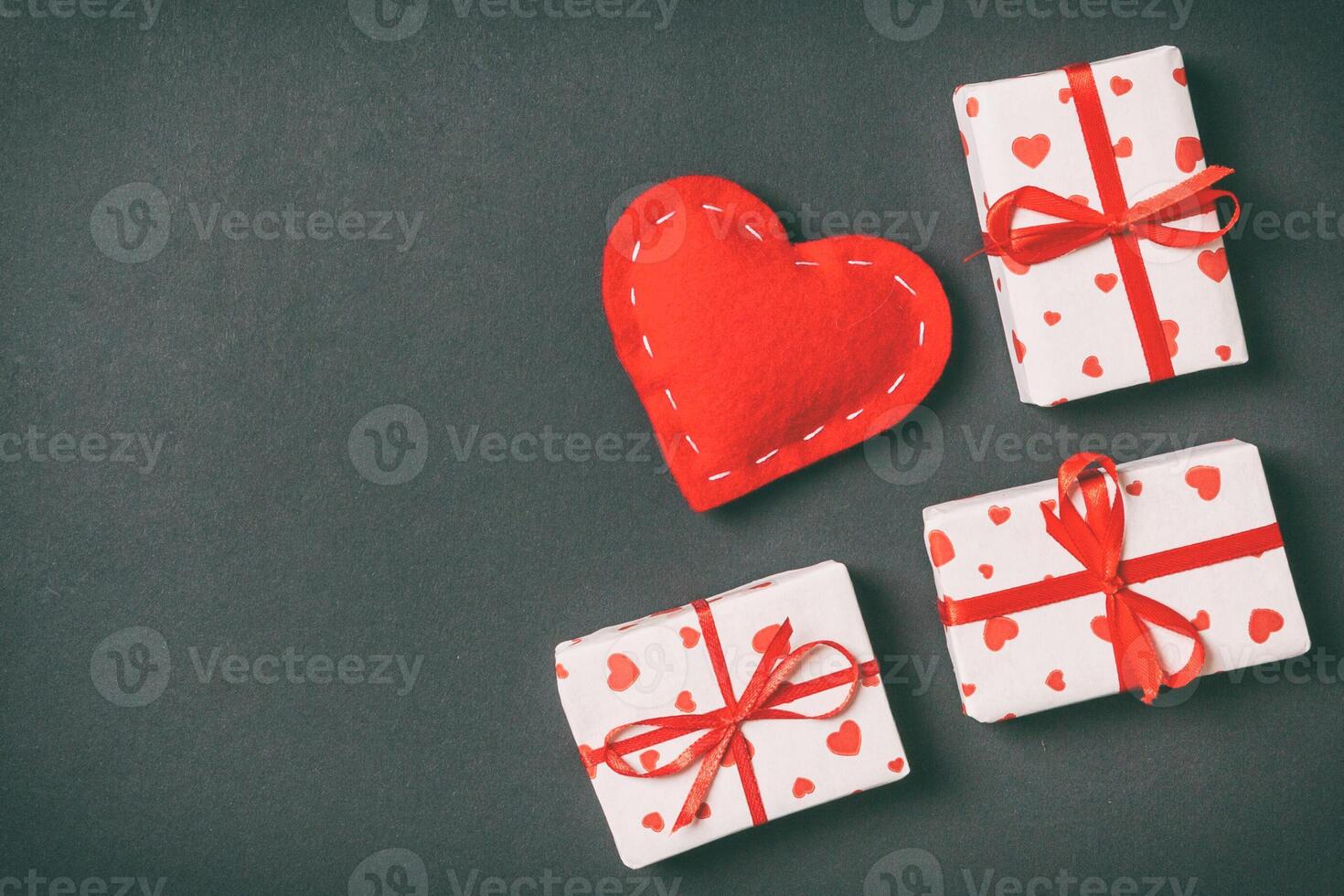 Top view colorful valentine background made red textile hearts. Valentine's Day concept with copy space photo