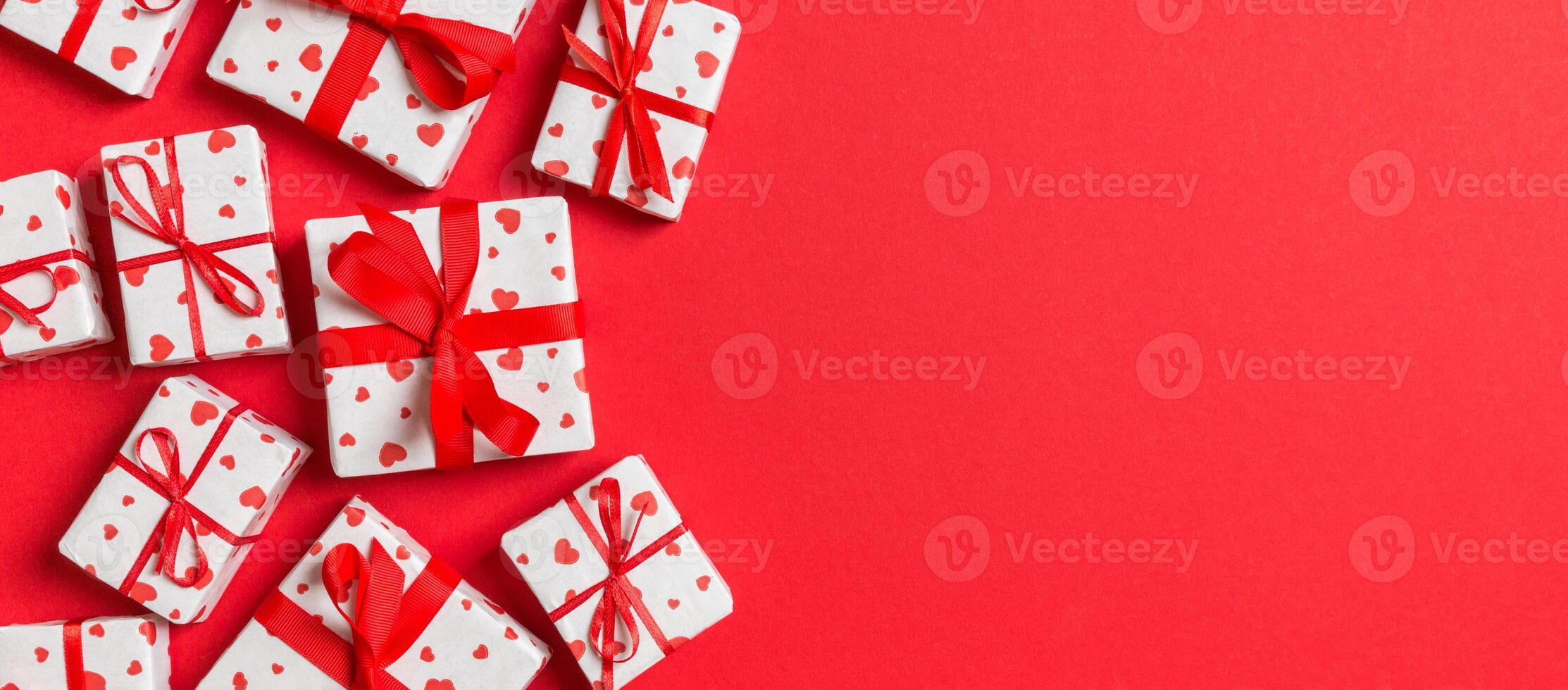 Top view colorful valentine background made of gift boxes photo
