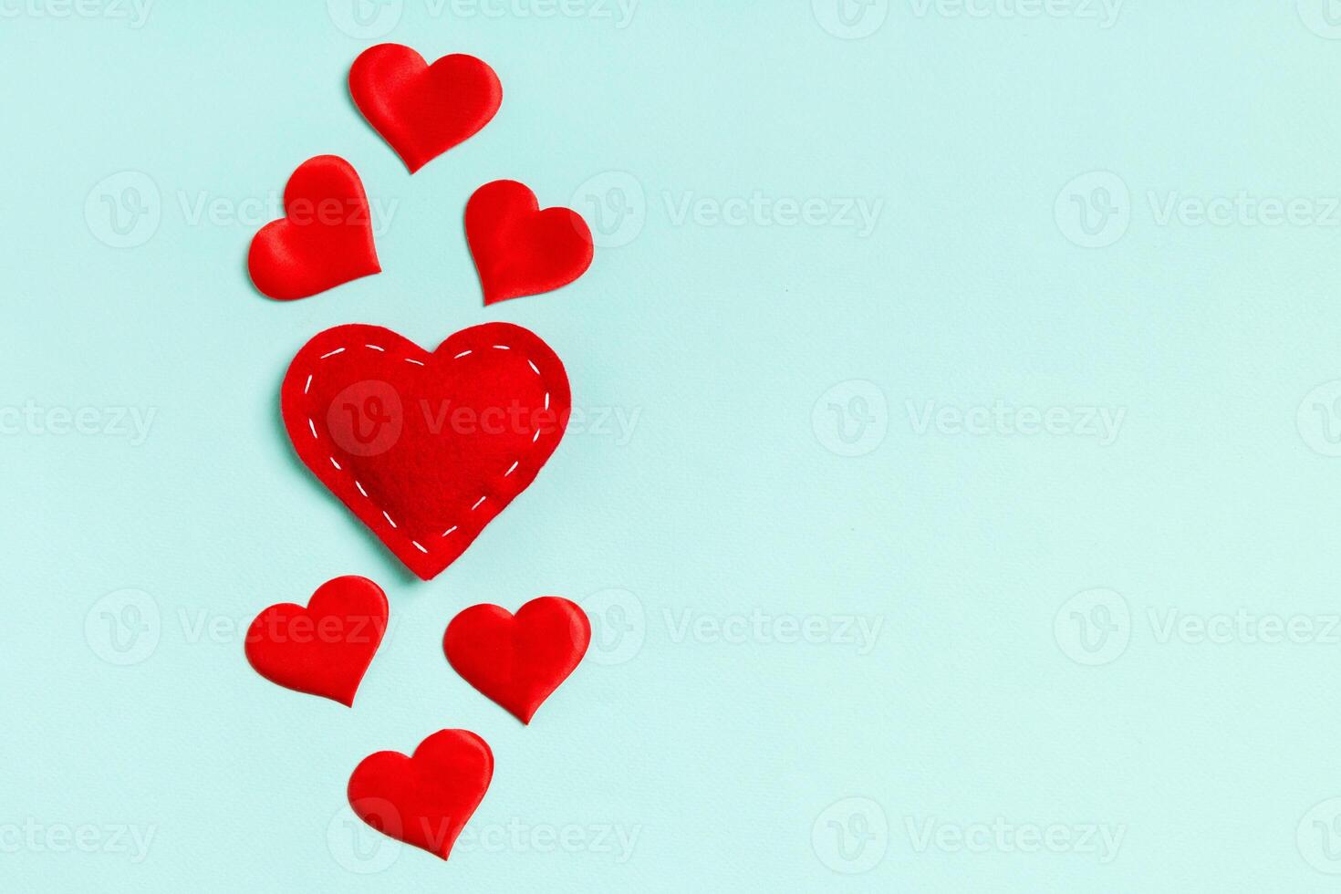 Top view composition of red hearts colorful background. photo