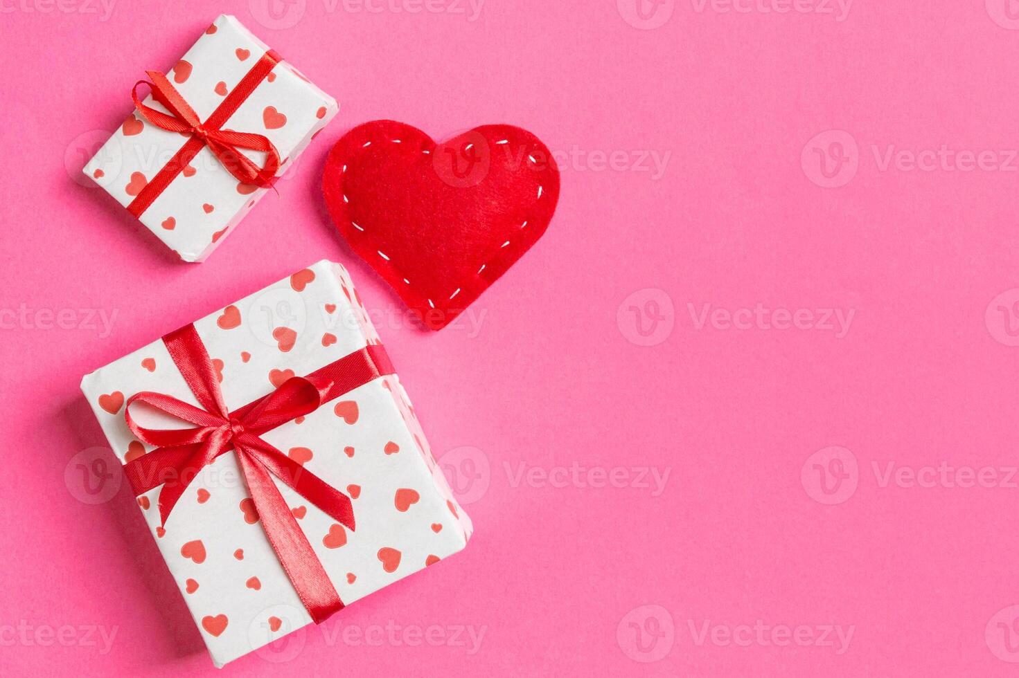 Top view colorful valentine background made gift boxes textile hearts. Valentine's Day concept with copy space photo