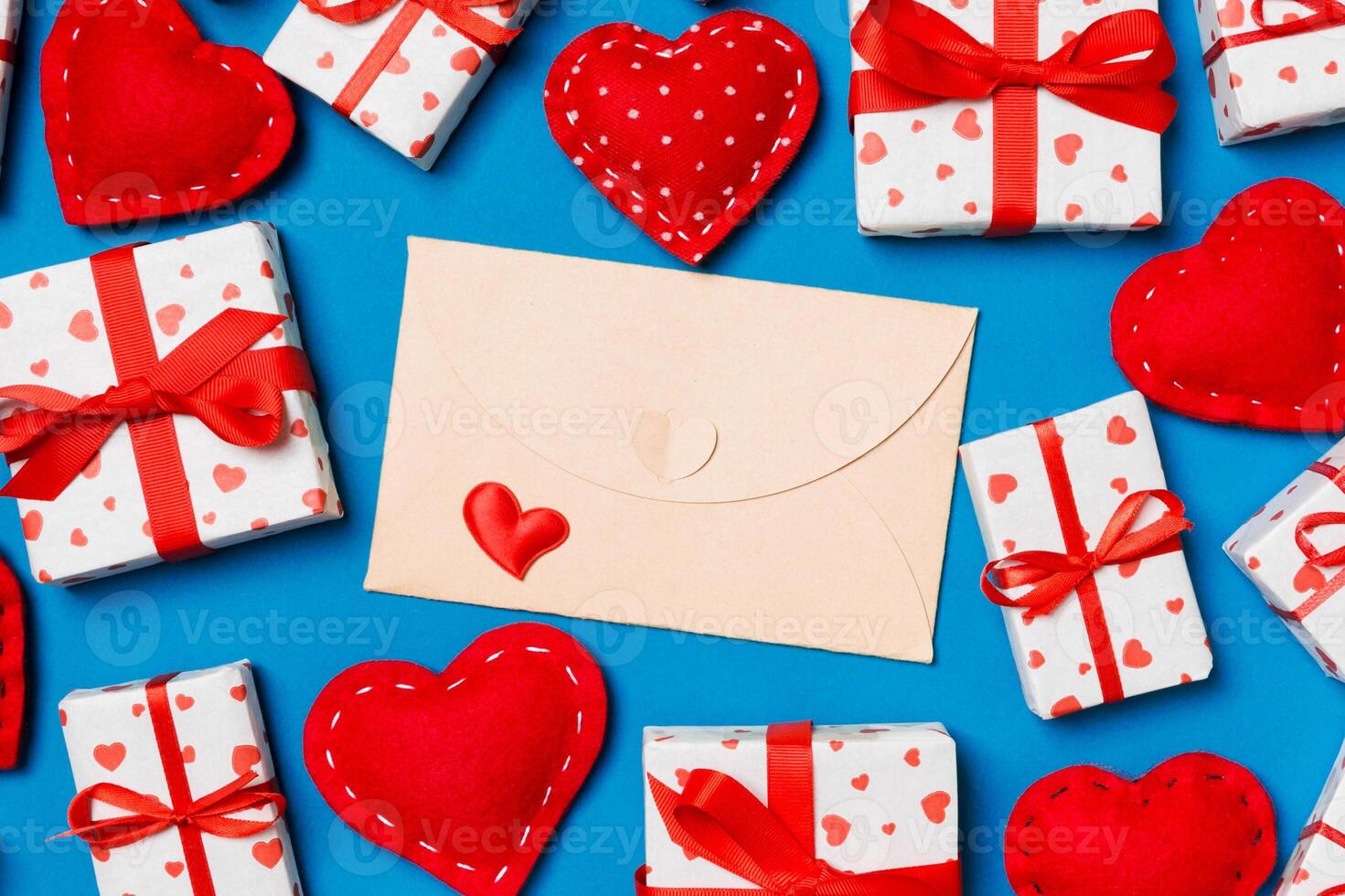 Top view of colorful valentine background made of craft envelope photo