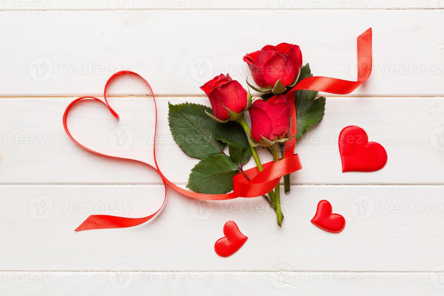 Valentine day composition with rose flower and red heart . Top view, flat lay, copy space Holiday concept photo