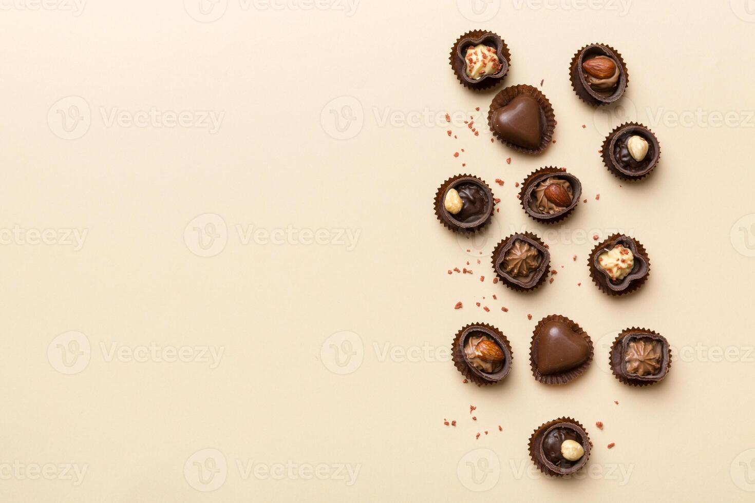 Different kinds of chocolates on table . and Flat Lay with copy space photo