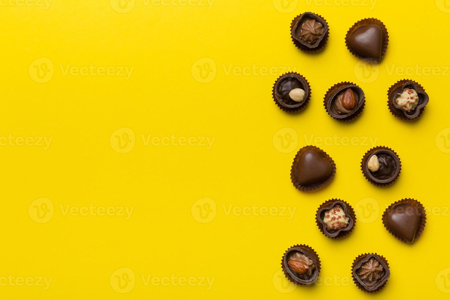 Different kinds of chocolates on close-up. and Flat Lay with copy space photo