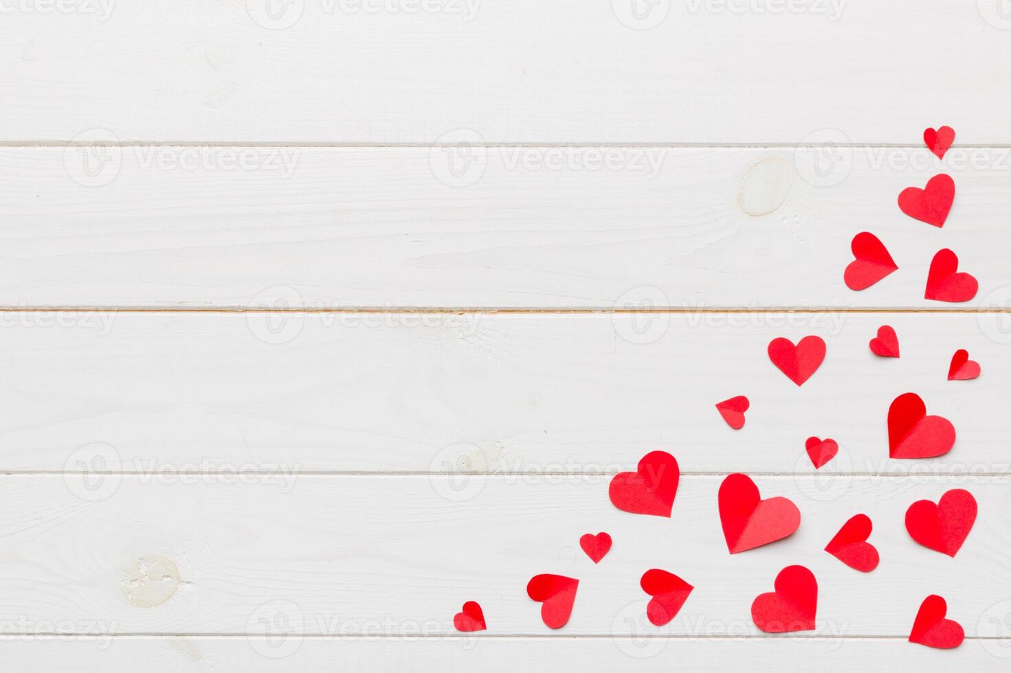 Valentine day with red hearts, top view with copy space photo