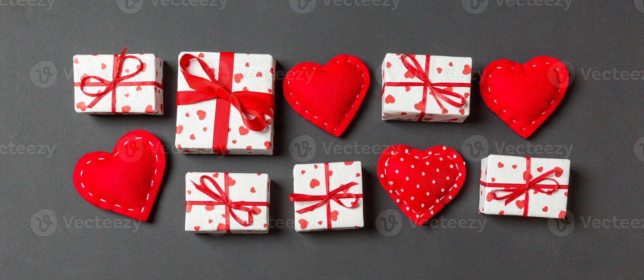 Top view colorful valentine background made gift boxes photo